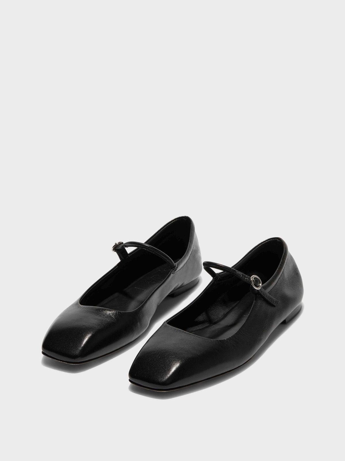 Black AEYDE Uma Mary Jane flats showing the squared toe and slim strap