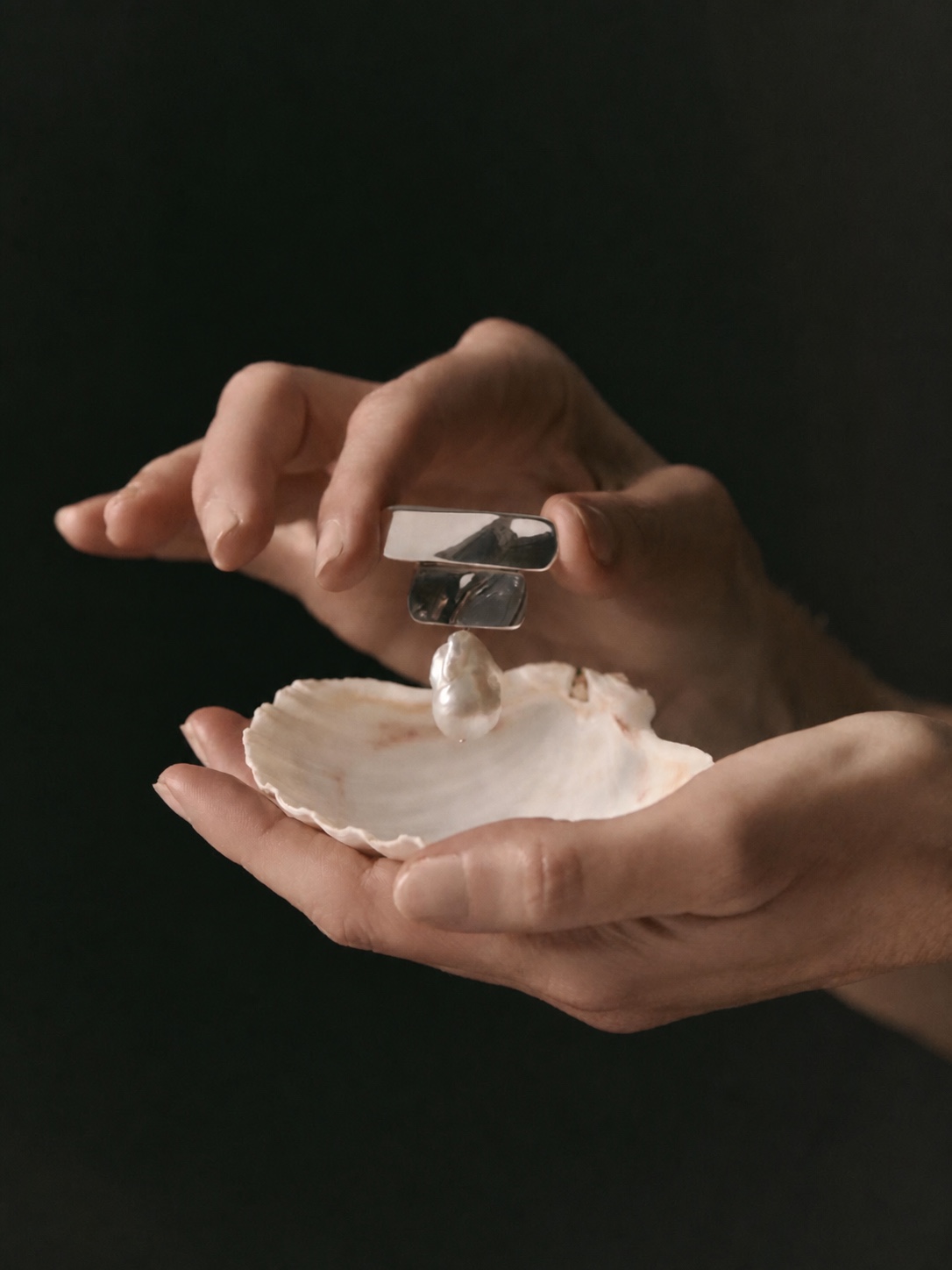 AGMES silver jewelry styled with a shell