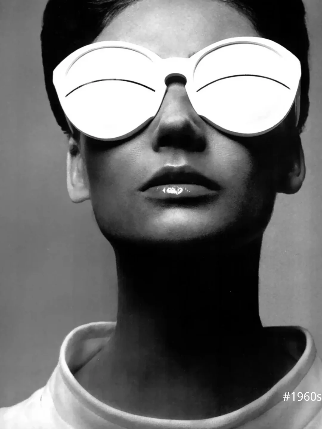 White Space Age eyewear and clean 1960s styling