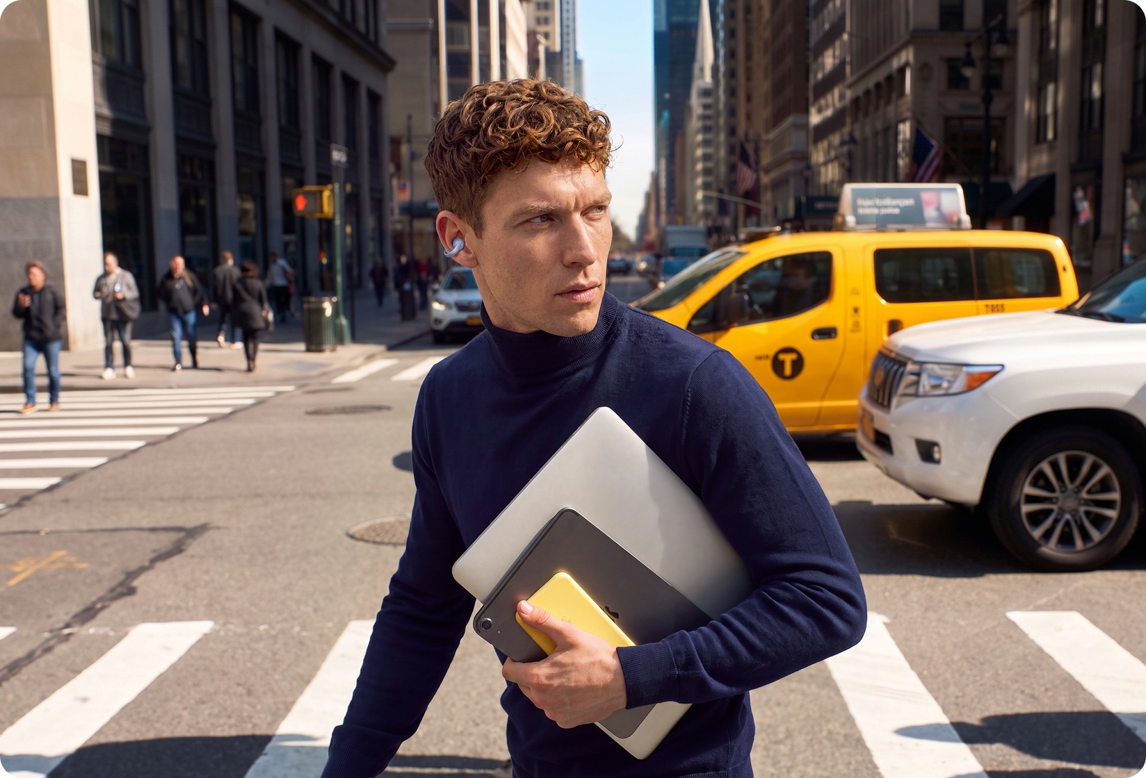 Anker AeroClip 2 worn as a visible wearable audio accessory in a city