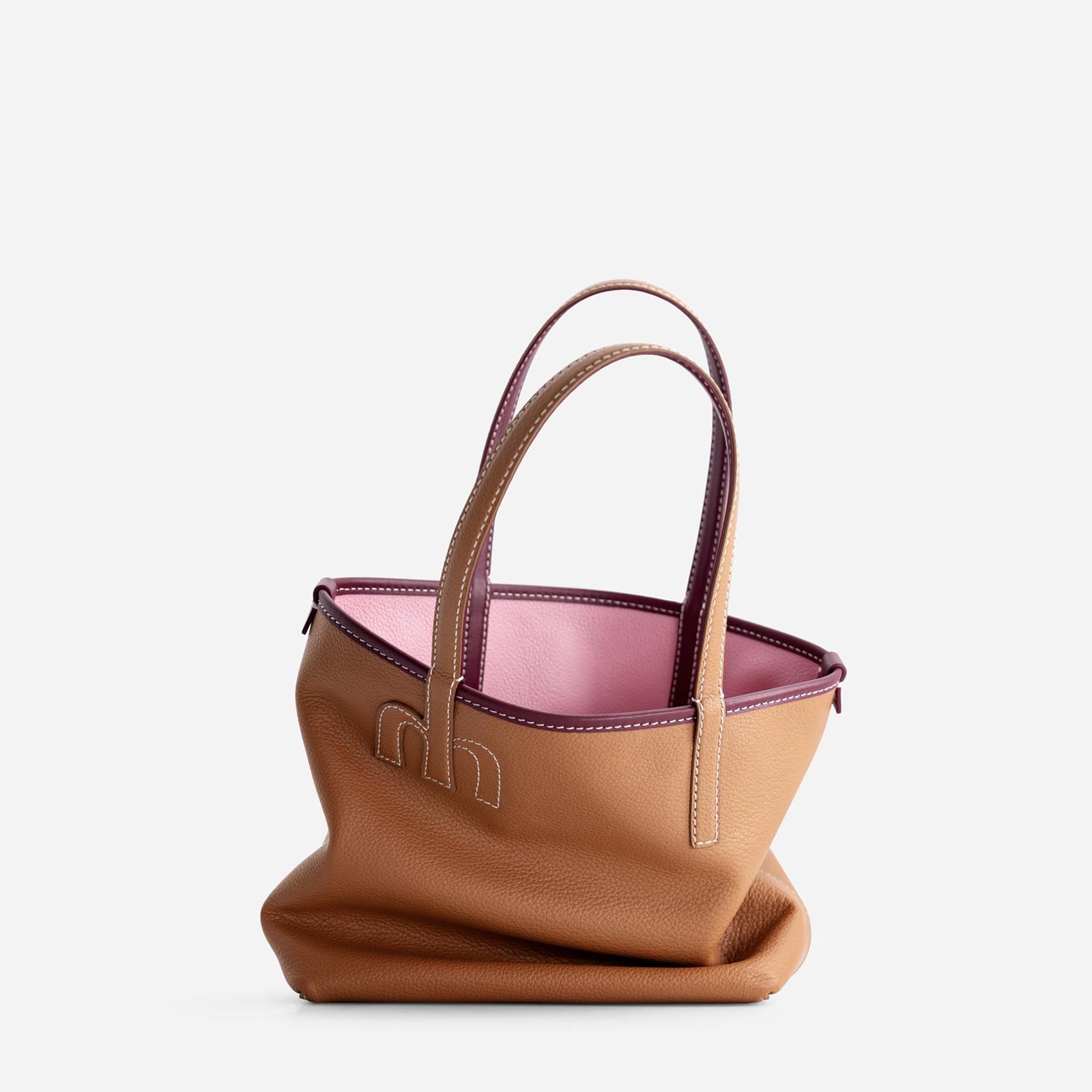 Mlouye architectural handbag built from geometric panels