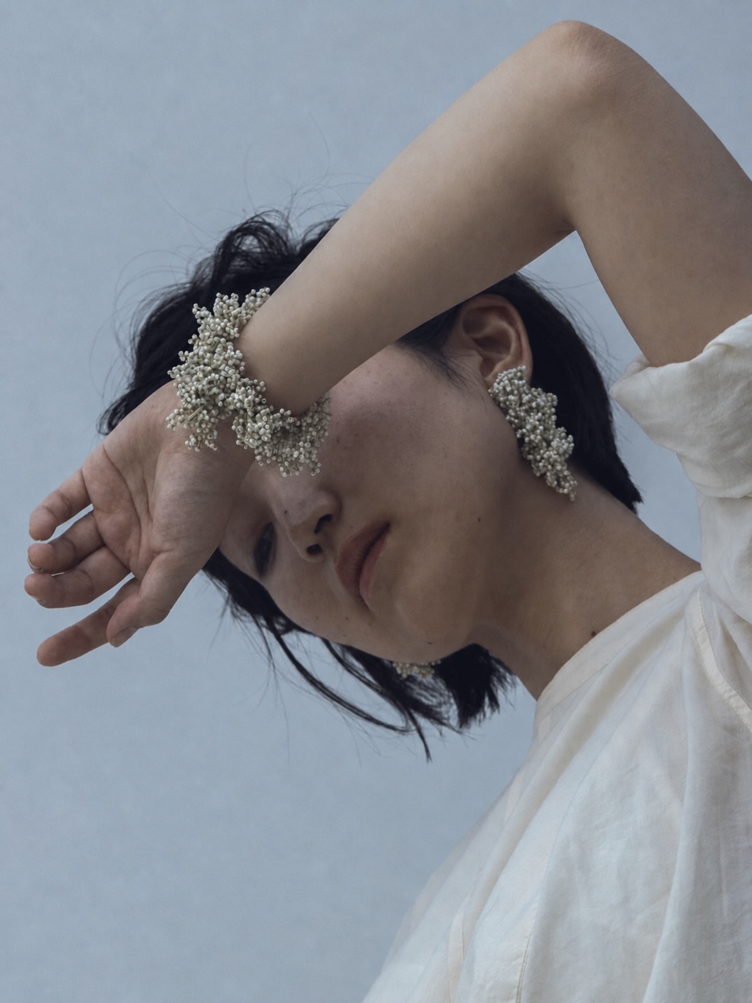 FUA silver beaded statement earring and layered necklaces