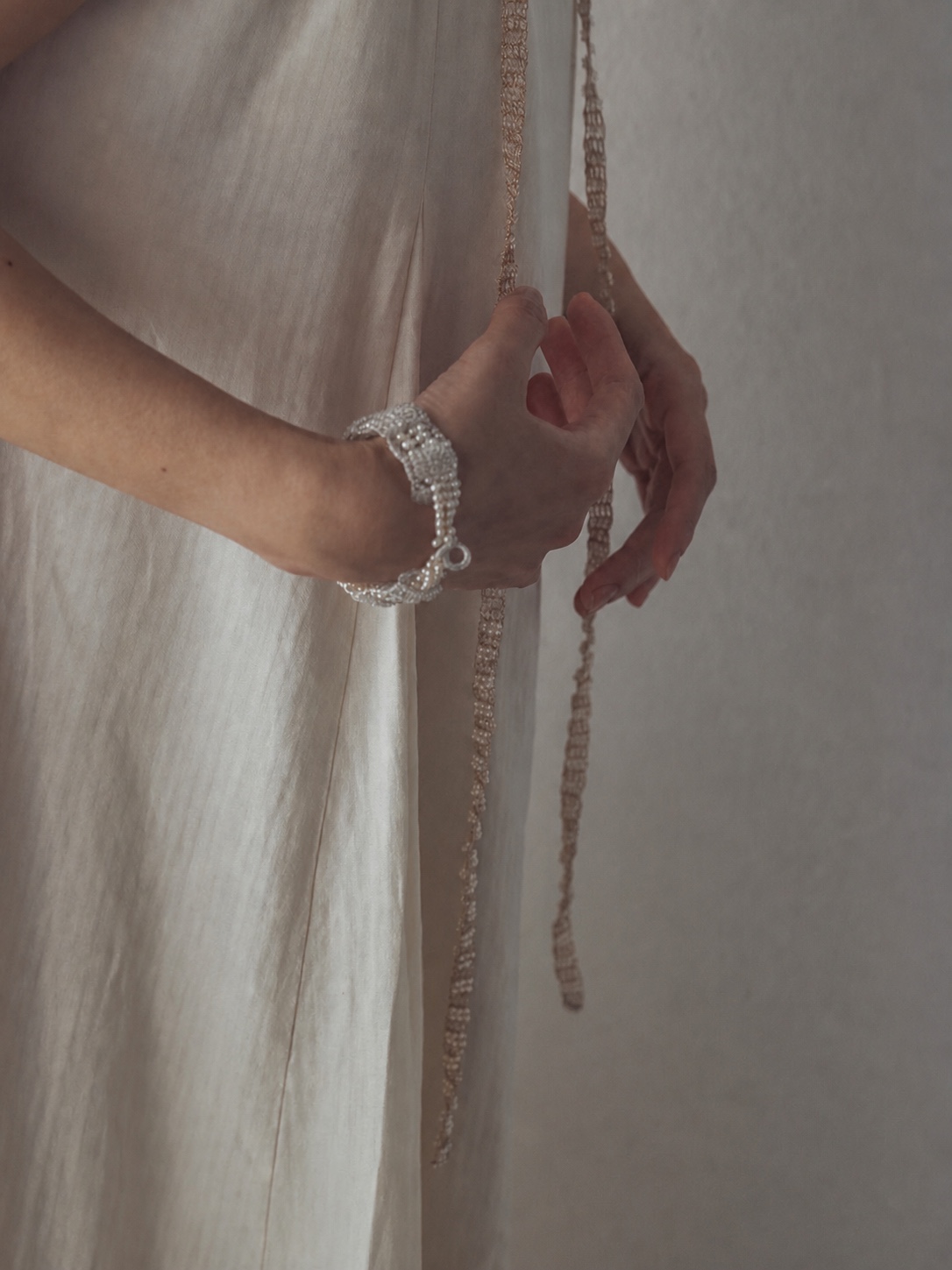 FUA pearl beaded earring and collar detail