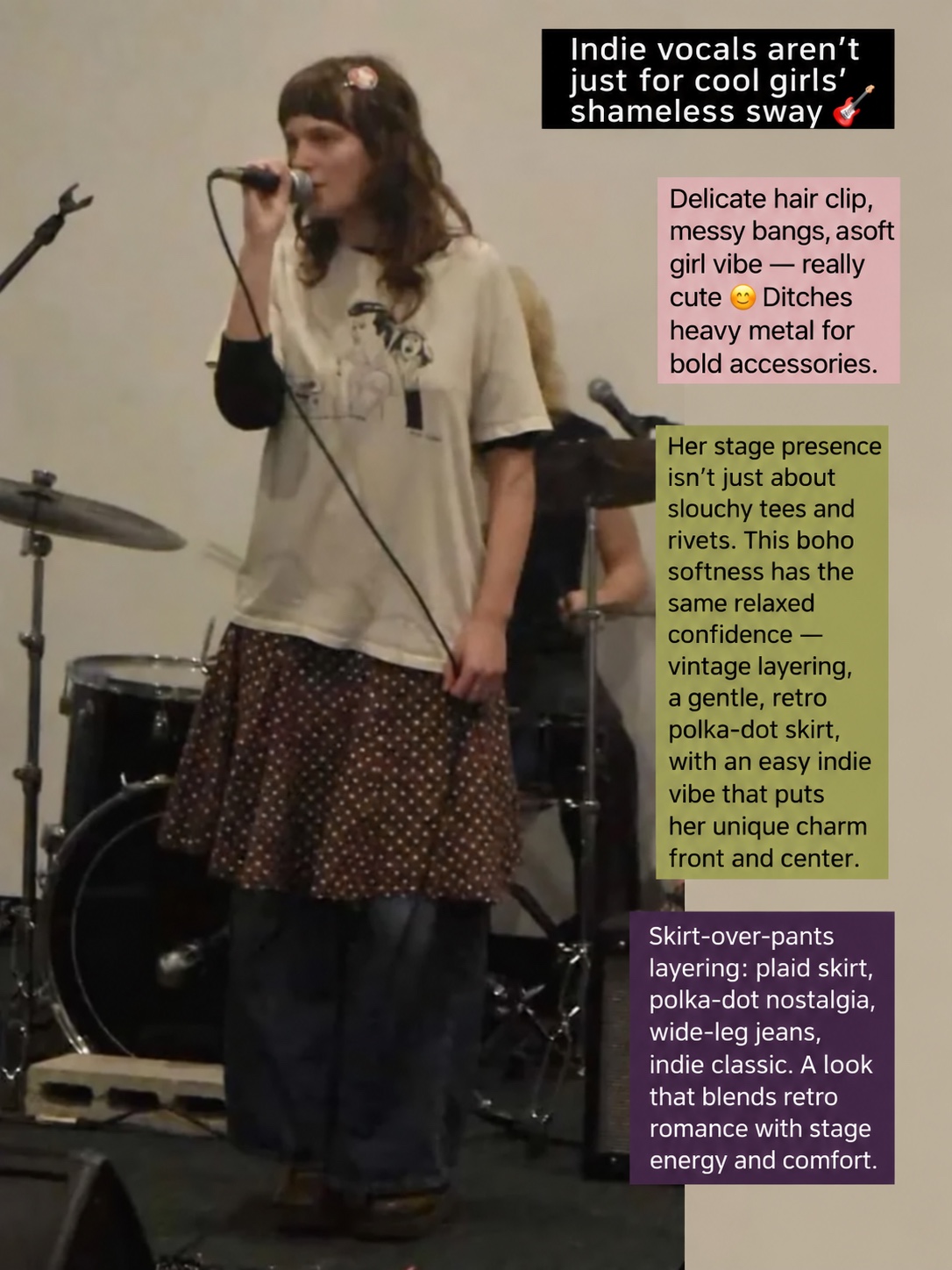 Singer in a pale graphic T-shirt and polka-dot skirt layered over dark trousers
