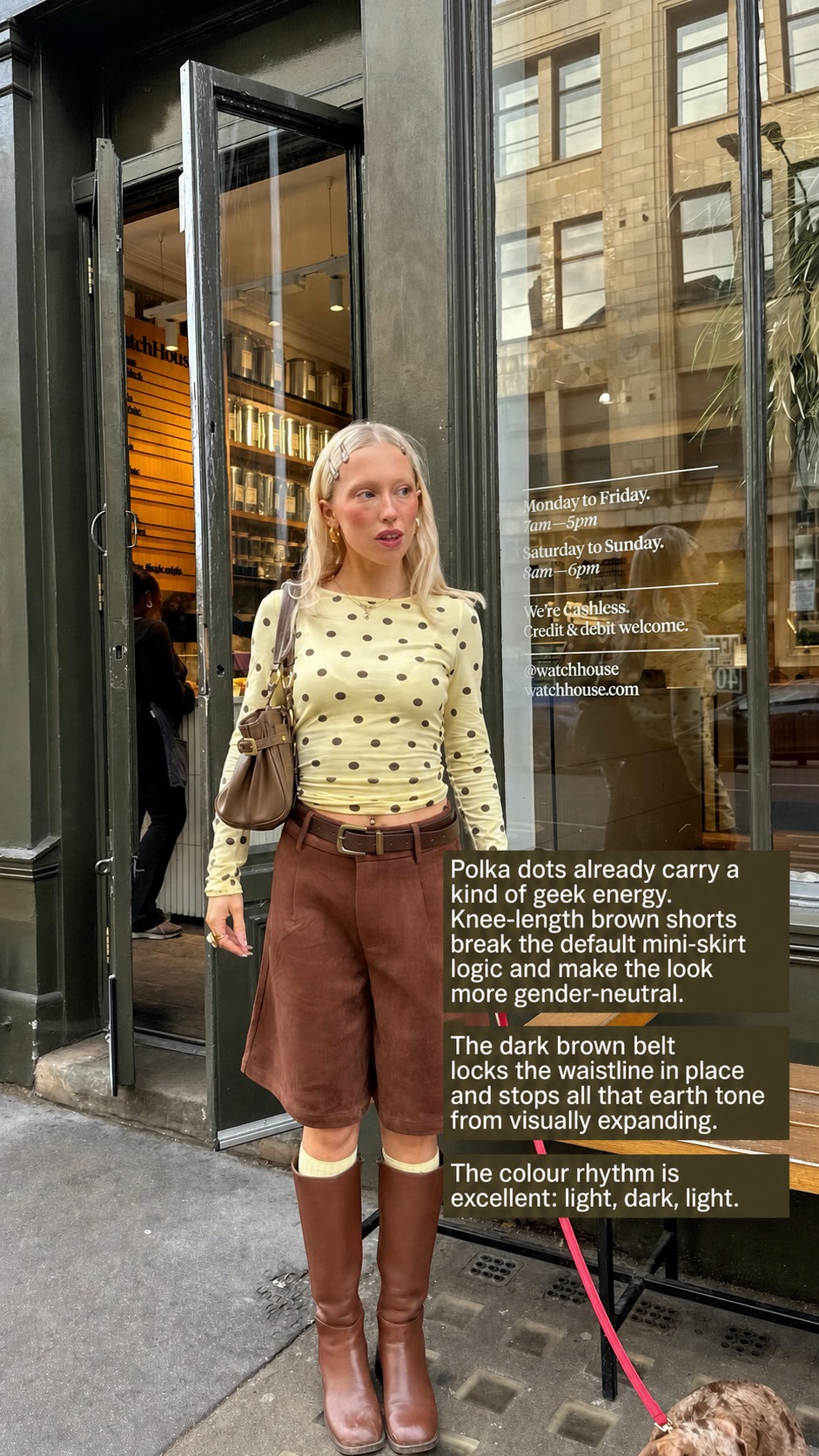 Pale yellow polka dot top with knee length brown shorts, brown belt and tall brown boots