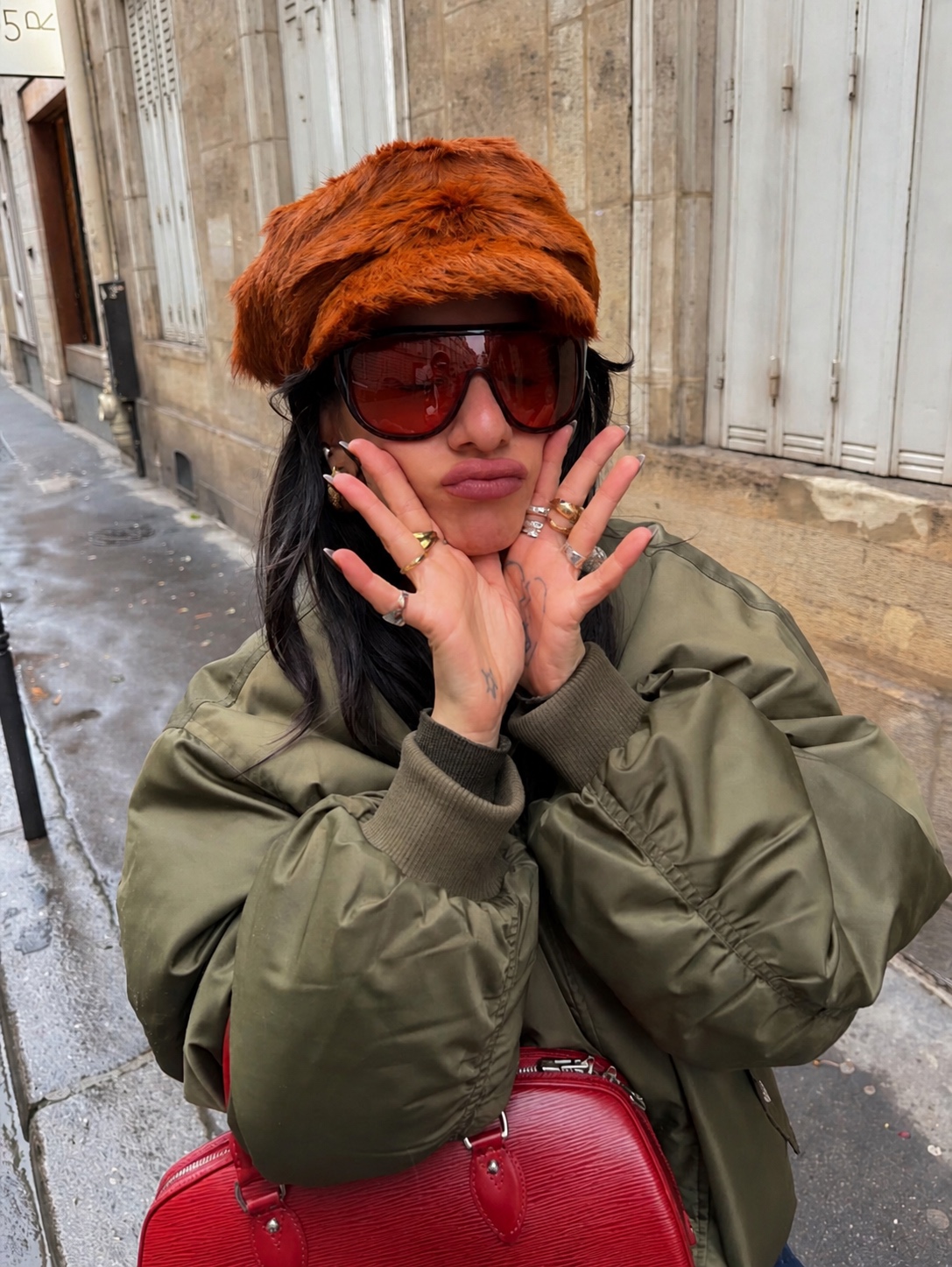 Boho summer outfit with layered accessories and lived-in European styling