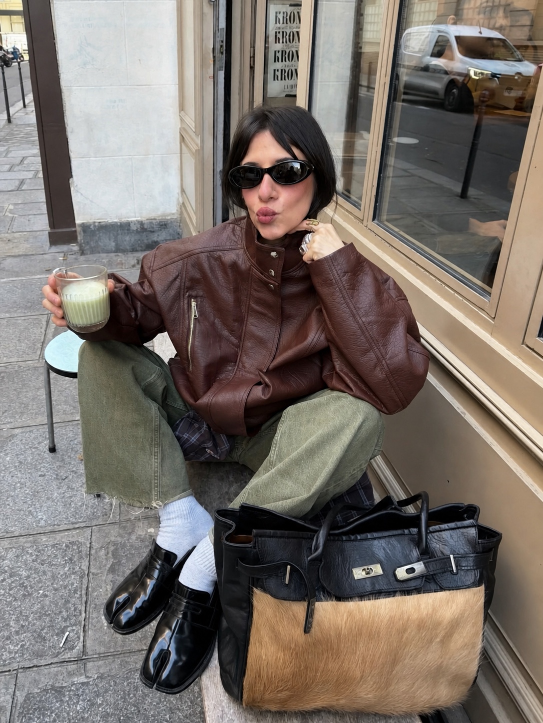 Color blocking retro outfit with bright accent, vintage styling and street setting