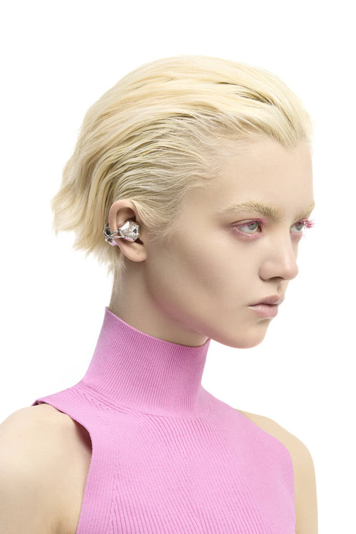 OF HUNGER Electronic Gems worn in a close ear profile