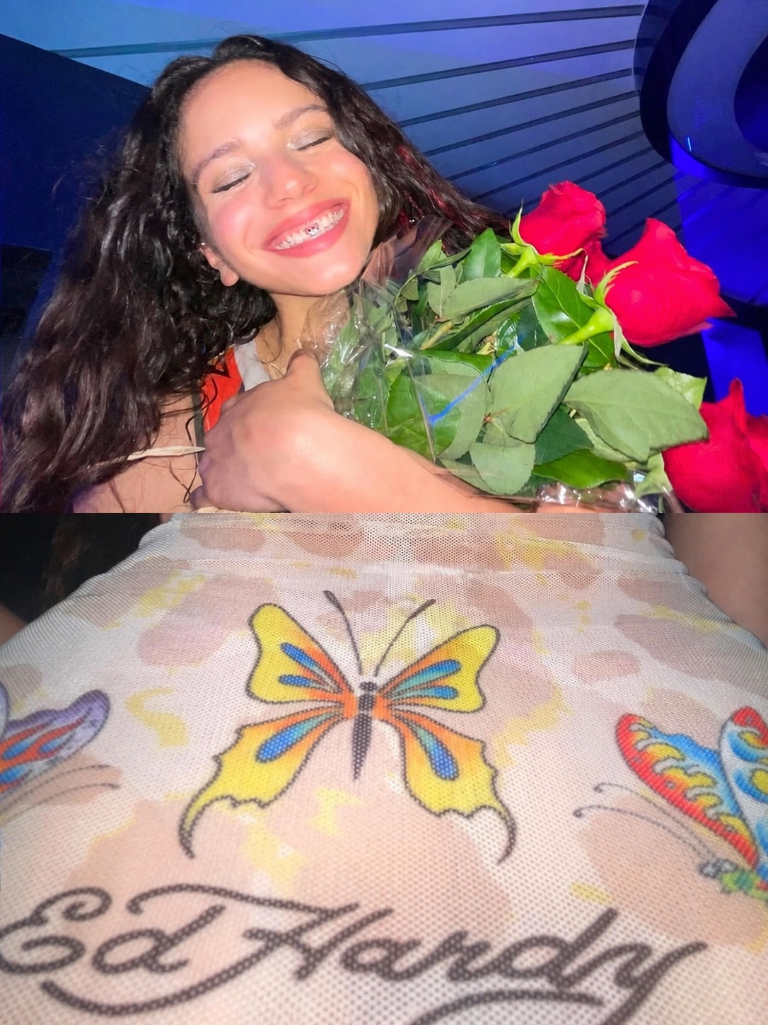 A woman holding red roses above a sheer Ed Hardy butterfly textile.