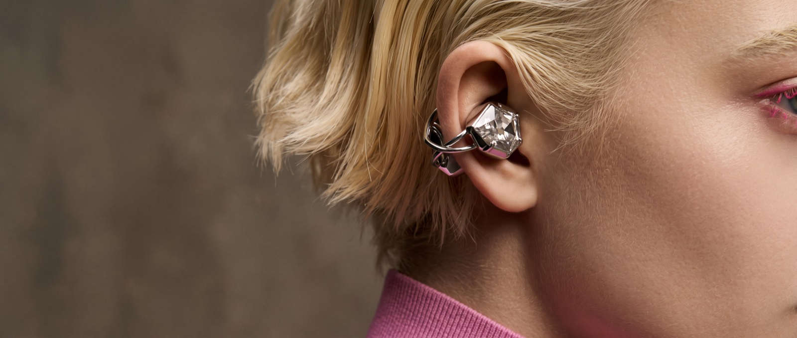 Elegant wireless earbuds finish close-up for going-out styling