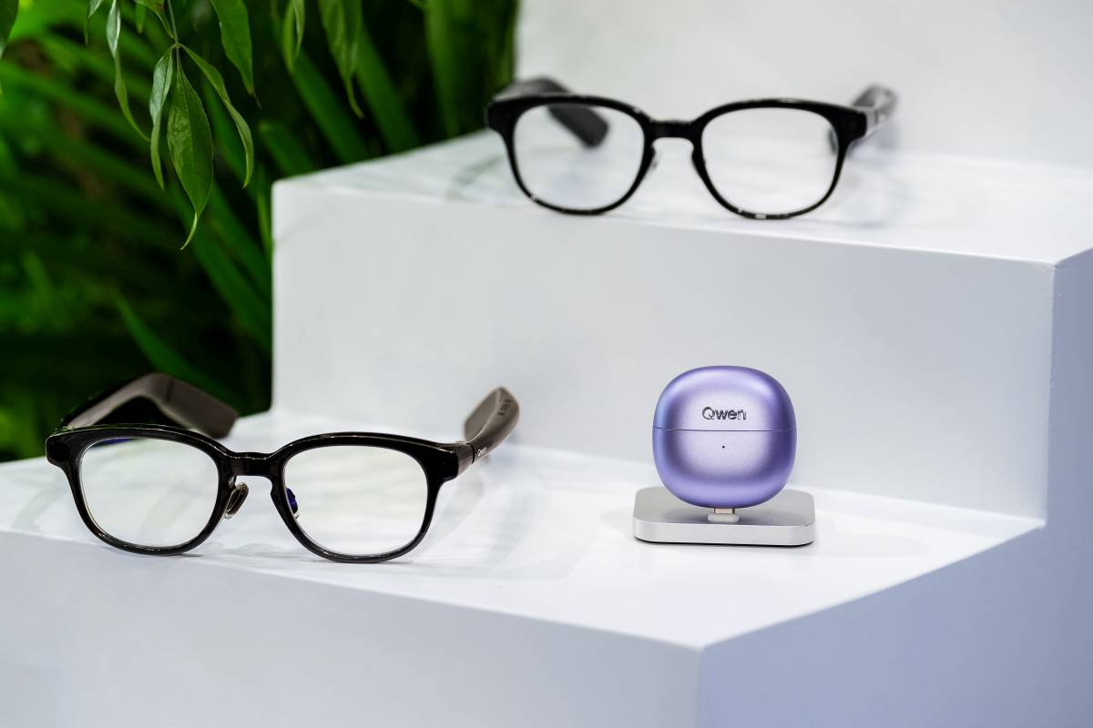 Qwen glasses and Qwen Clip displayed at the Apsara Conference.