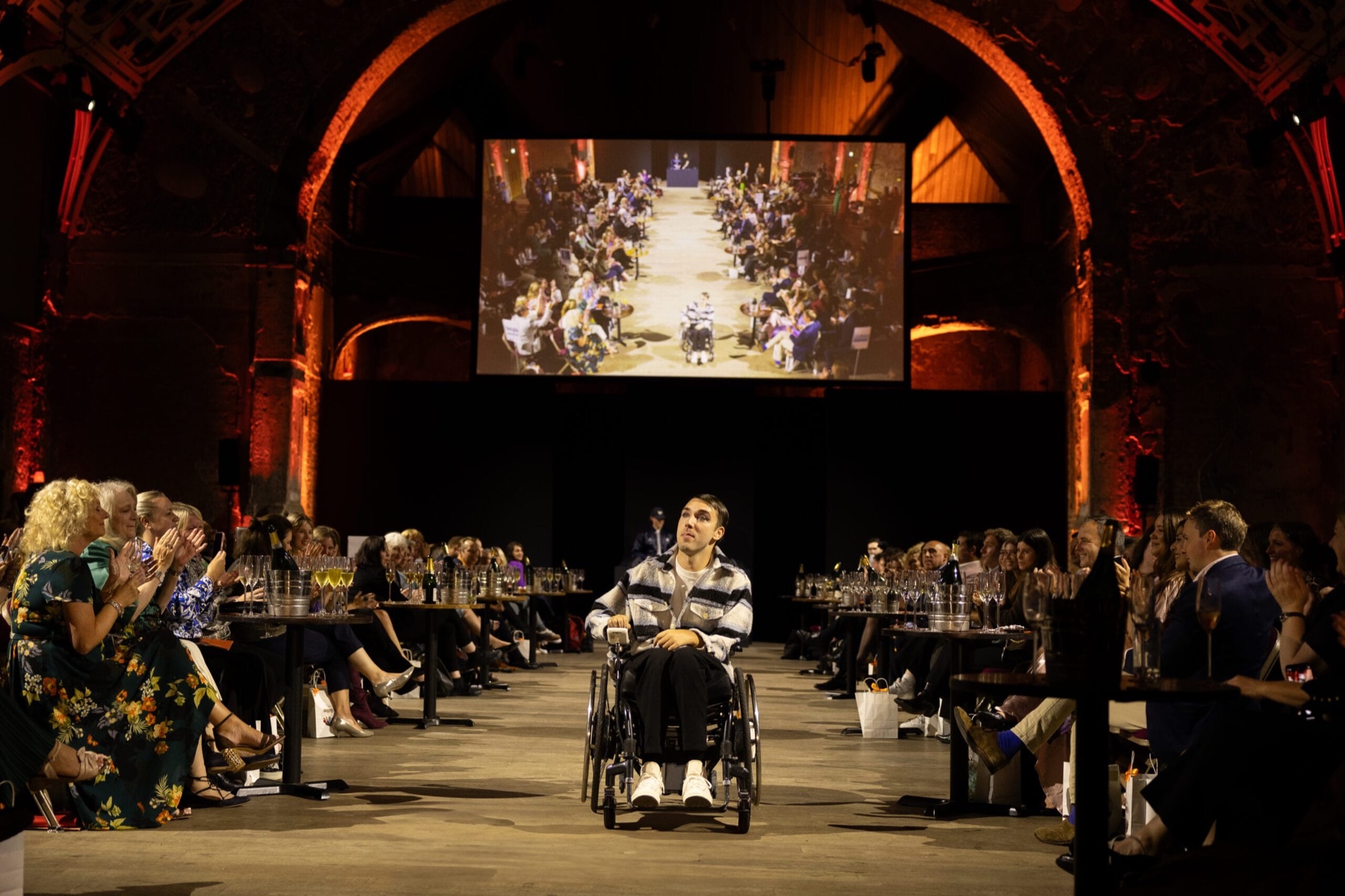 A wheelchair user taking part in London's Front Row adaptive fashion show.