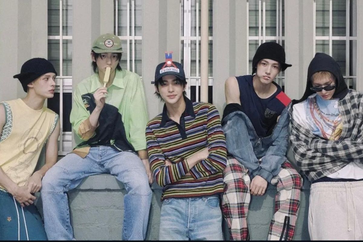 CORTIS members in varied hats, loose denim, plaid layers, and unresolved streetwear proportions