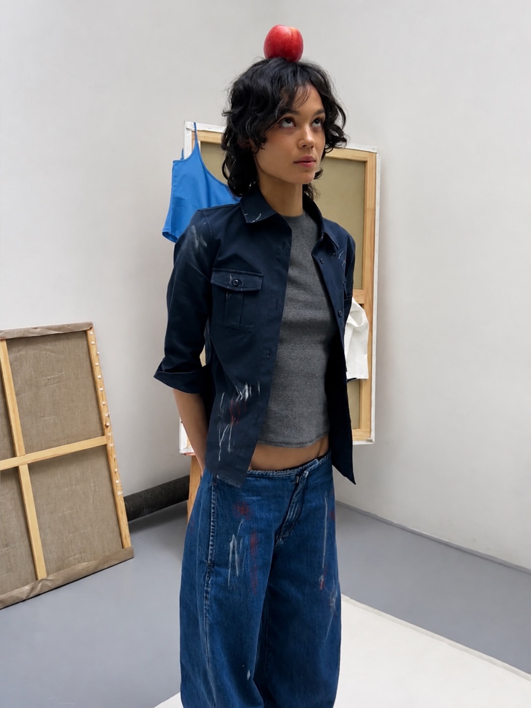 A relaxed art student outfit with fluid styling and soft masculine-feminine balance