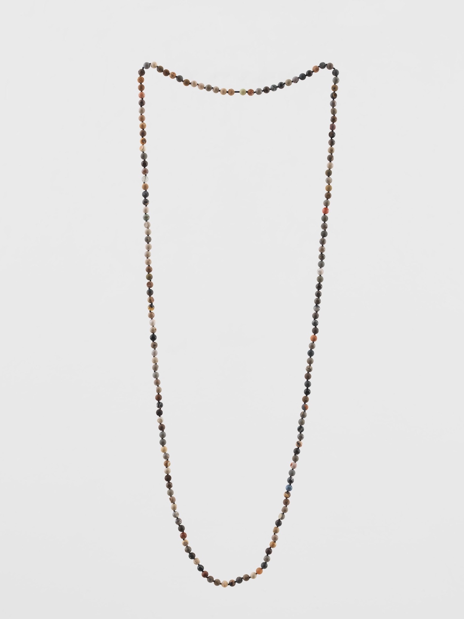 Katie Paterson's Fossil Necklace, made from spherical fossil beads.