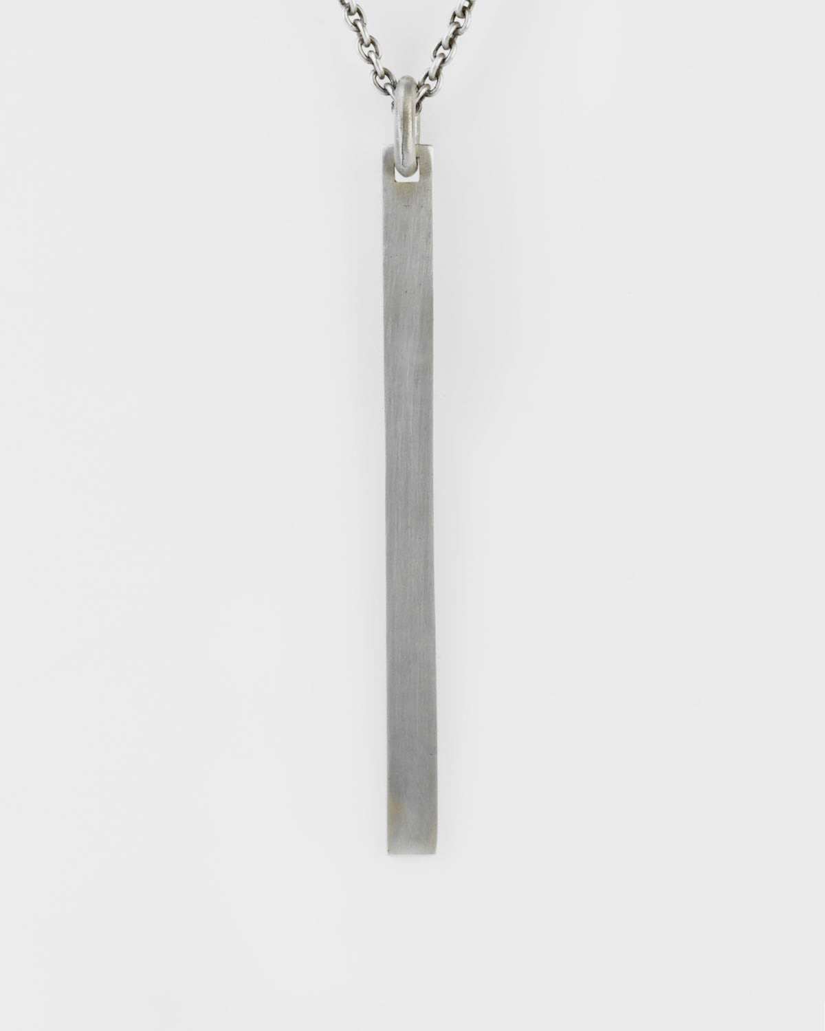 Parts of Four silver plate necklace with an acid-etched finish