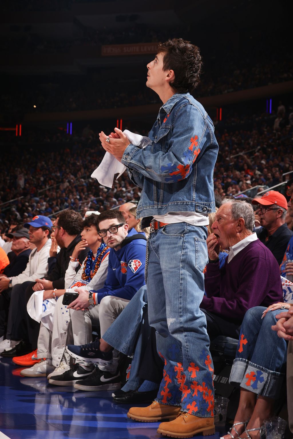 Timothée Chalamet wearing Chrome Hearts custom denim and jewelry at a 2026 NBA Finals game