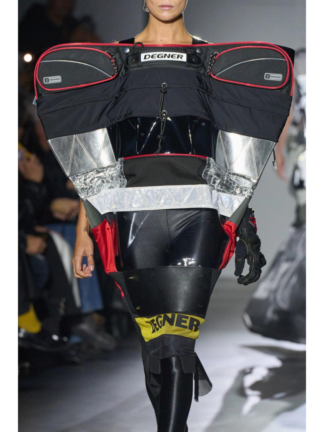 Junya Watanabe SS2025 black and silver structured runway look with widened shoulders