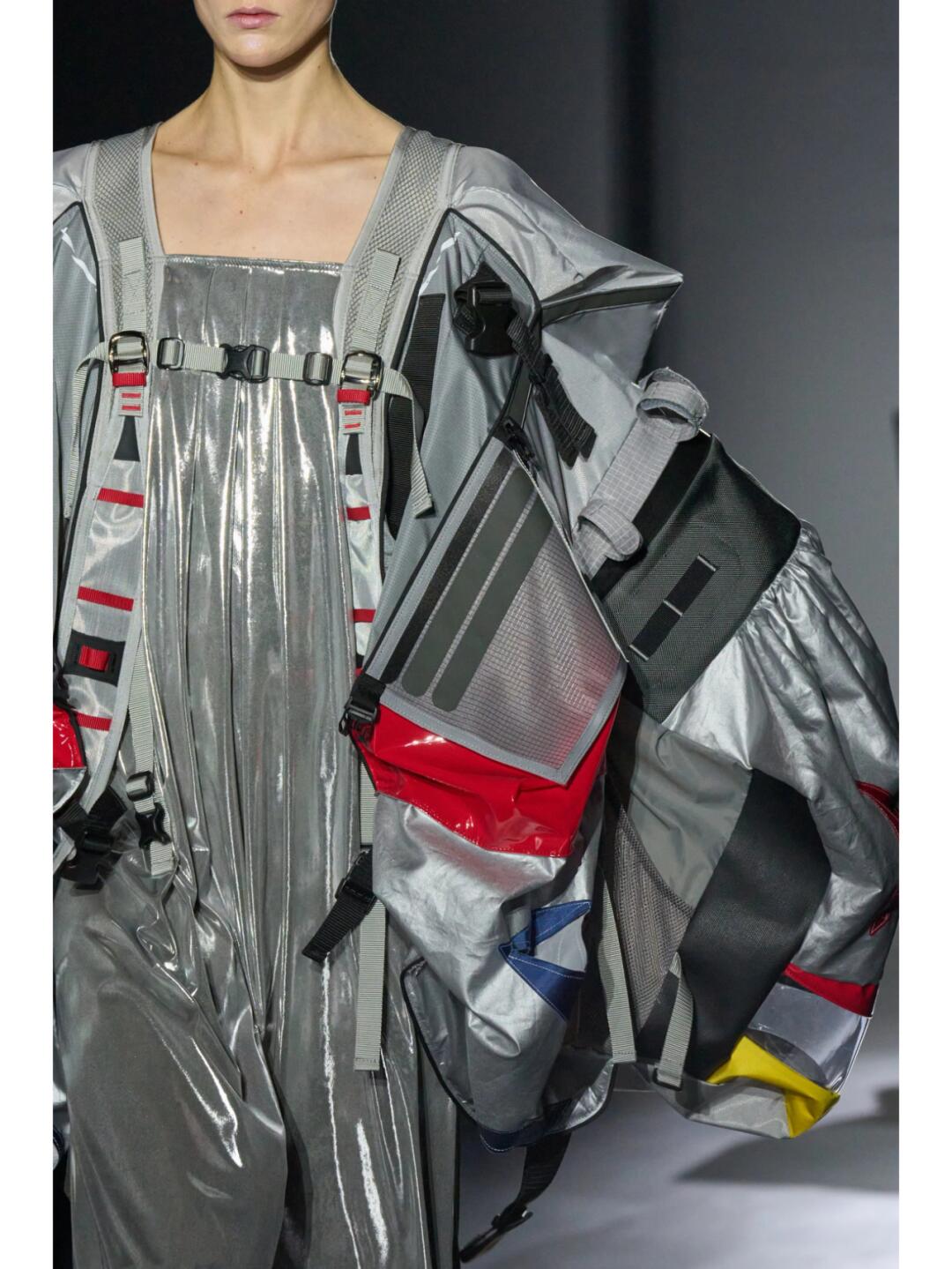 Silver Junya Watanabe SS2025 dress with utility straps, red details and structured side panels