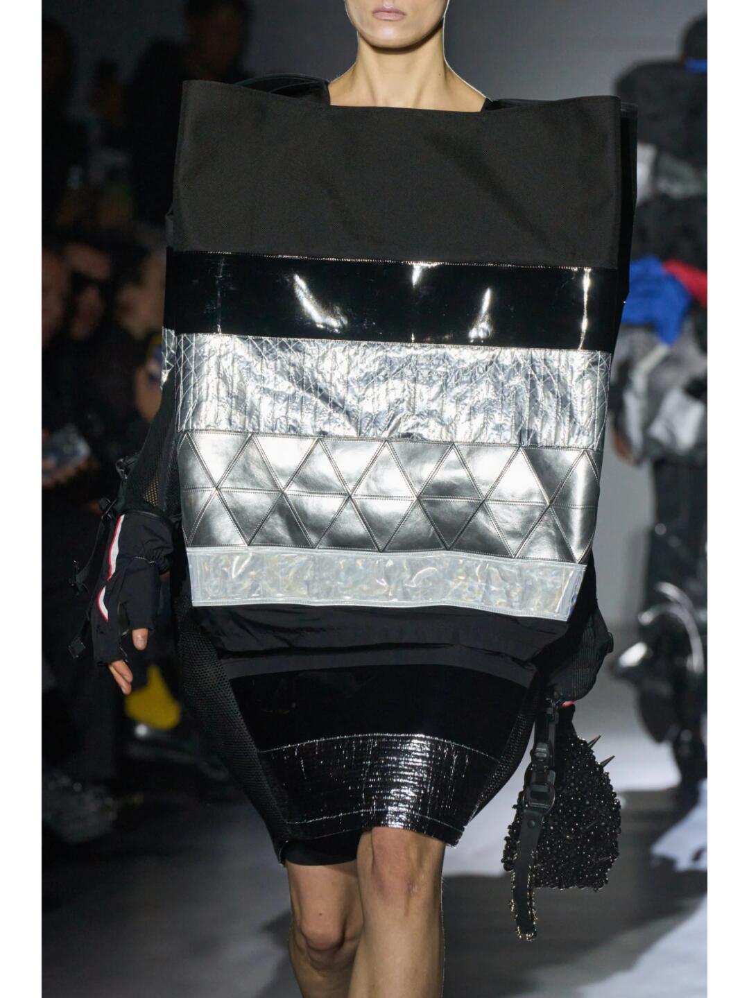 Black Junya Watanabe SS2025 dress with a quilted silver rectangular panel