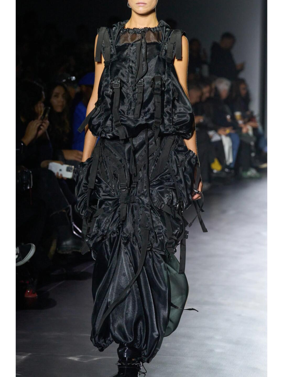 Black Junya Watanabe SS2025 runway look with crushed volume and layered fabric