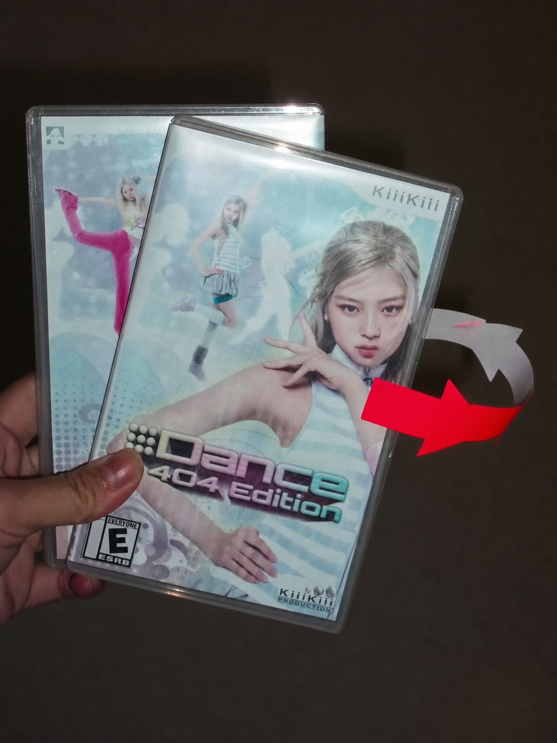 Dance 404 edition cover case held in low light