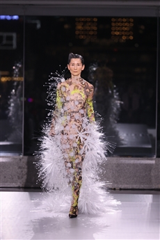 Christina Chung wearing a futuristic KIT WAN STUDIOS fashion look