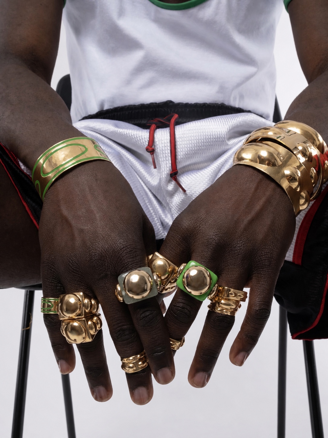 Green and gold La Manso statement bracelet with sculptural rings