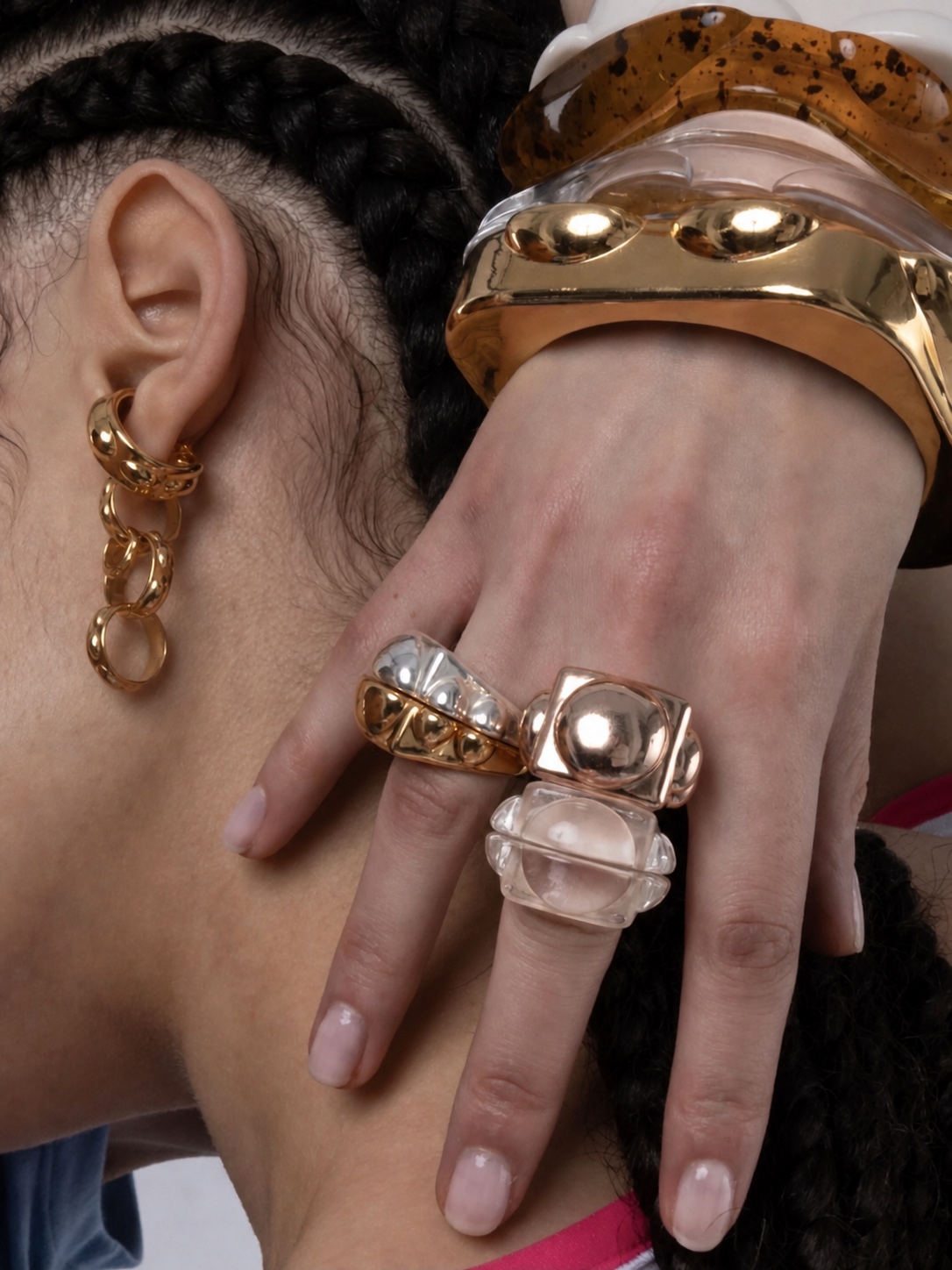 Gold and silver La Manso sculptural rings and earrings