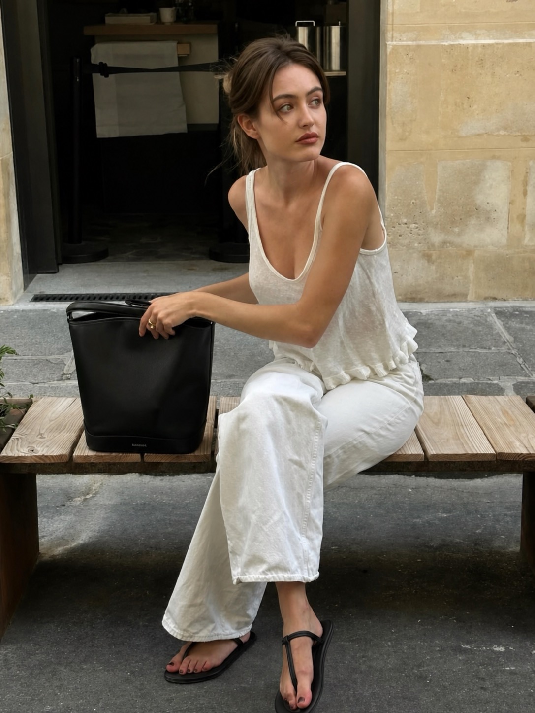 dark neutral outfit with velvet texture and french vintage mood