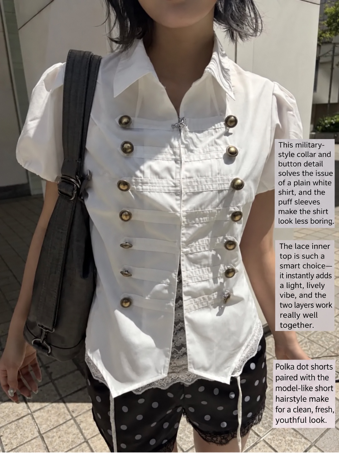 White military-style vest over a puff-sleeve blouse and lace, paired with black polka-dot shorts