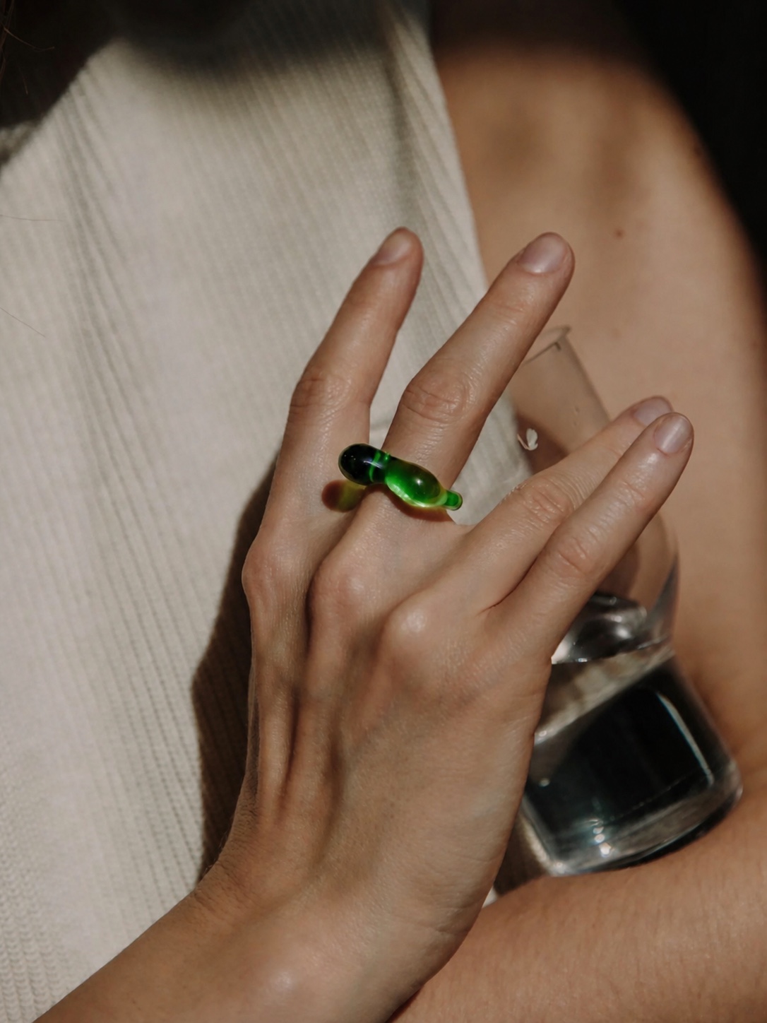 Nathalie Schreckenberg green ring on a hand
