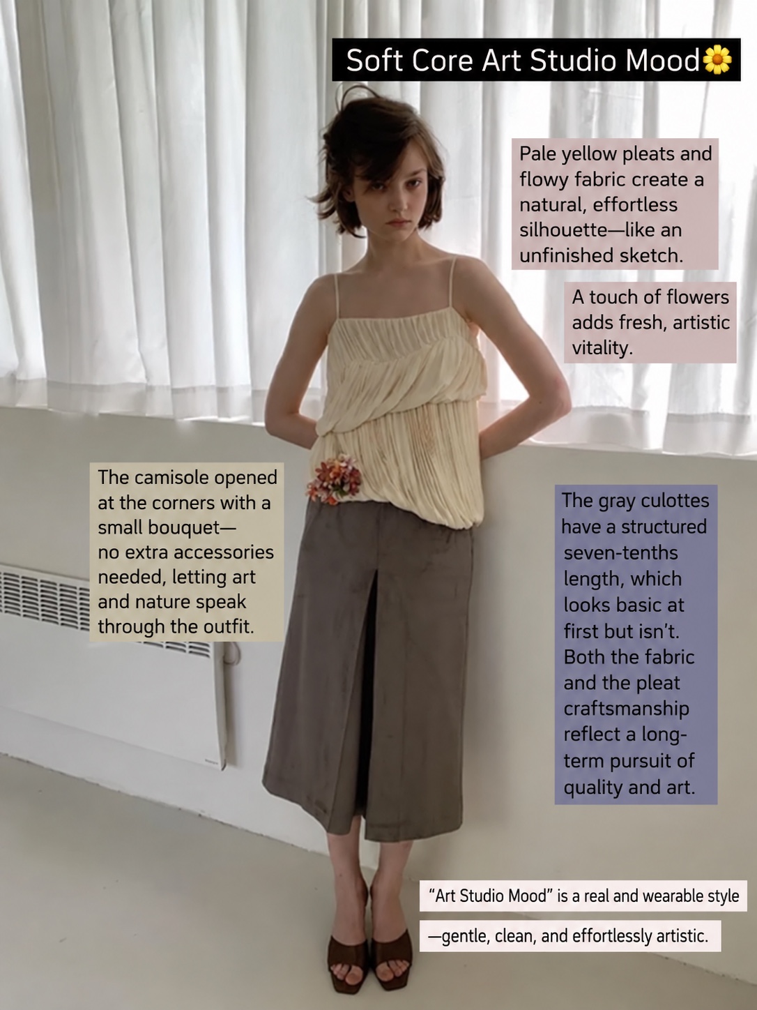 Pale pleated camisole with a small floral brooch and grey wide-leg cropped trousers