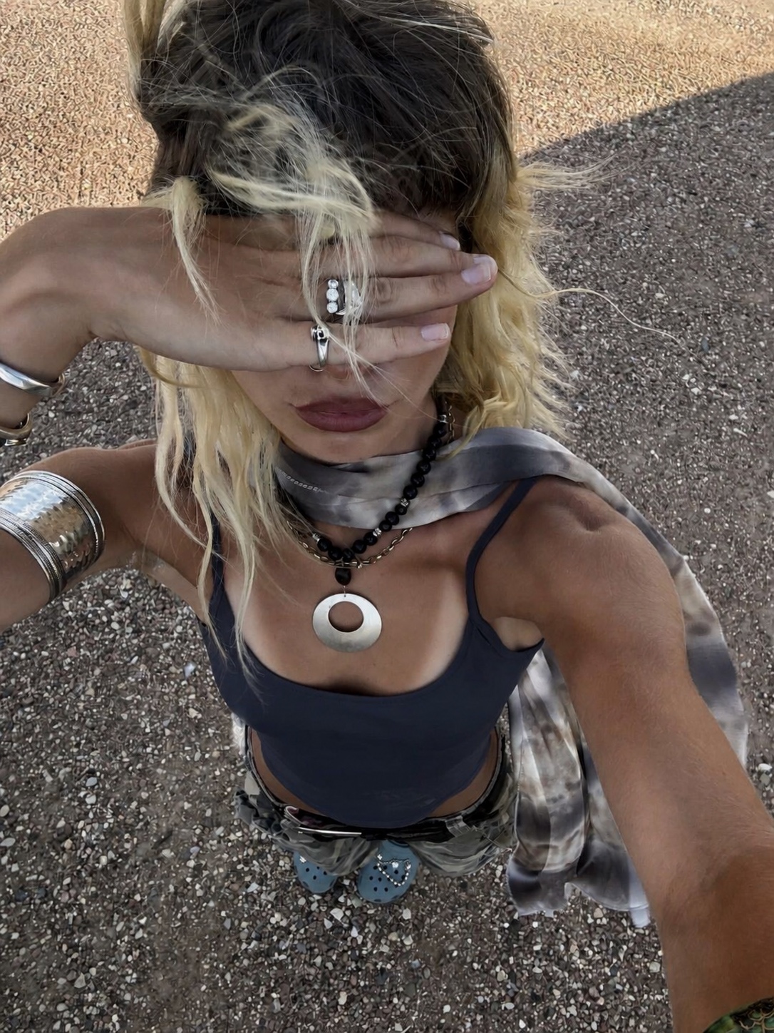 Grunge punk outfit with animal print texture and layered accessories