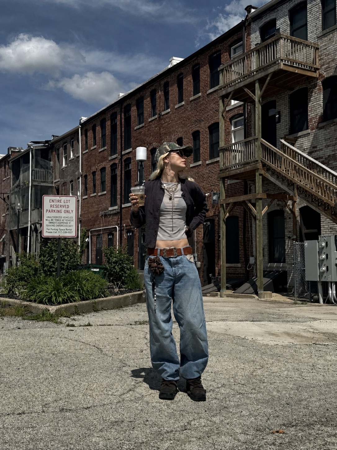 Alt girl punk styling with messy layers and strong accessories