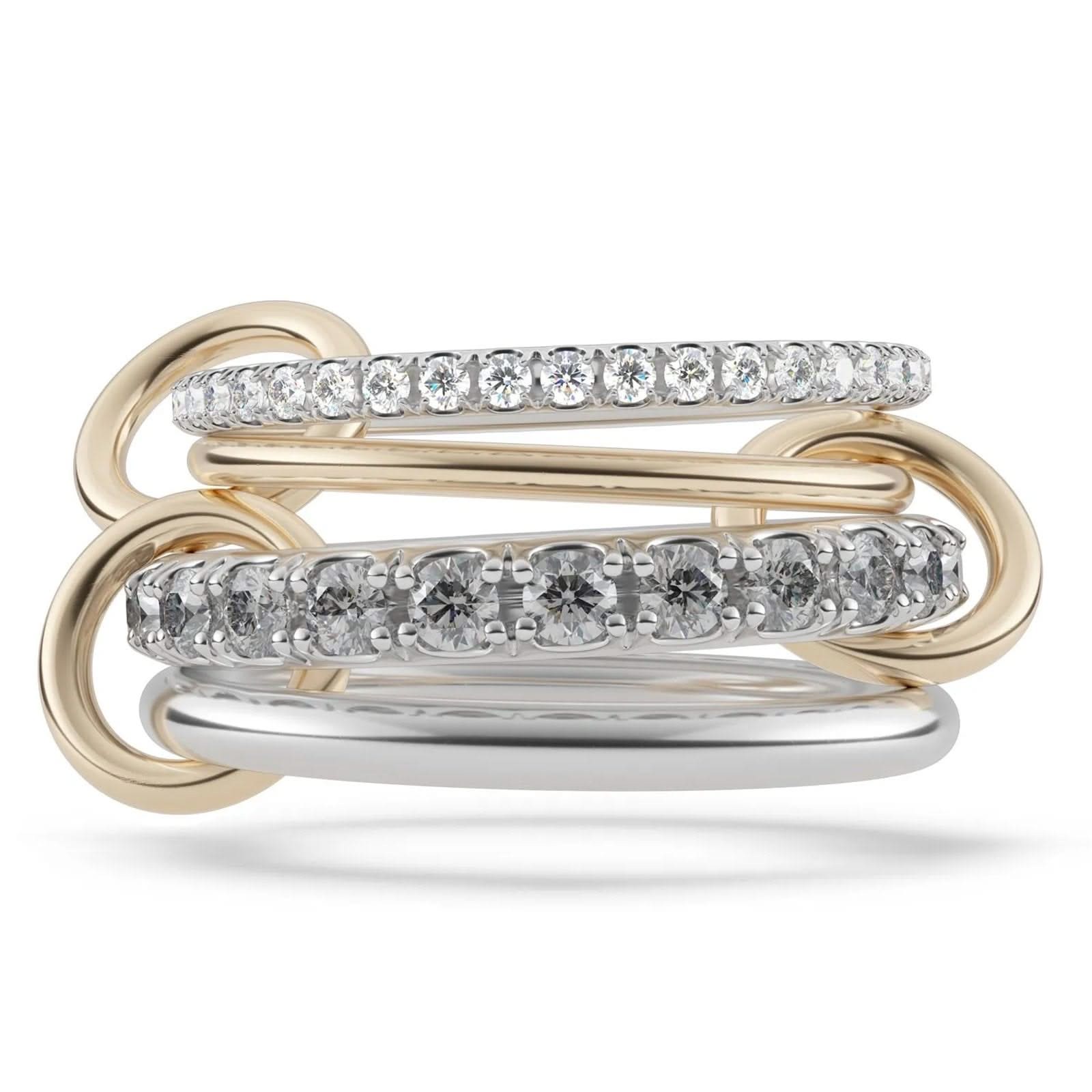 Spinelli Kilcollin interconnected Galaxy rings in mixed metals arranged as a sculptural stack