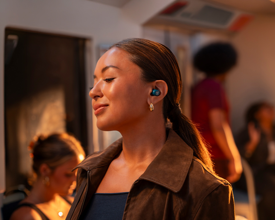 JLab Jélle fashion earbuds with glossy finishes and colorful accessory styling
