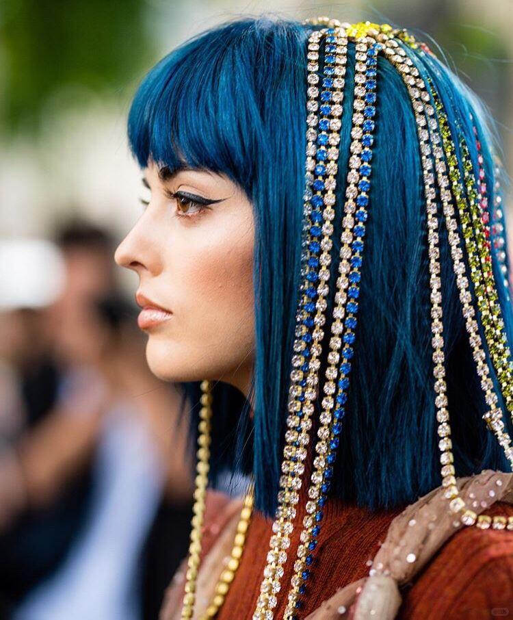 Blue hair with layered statement hair accessories