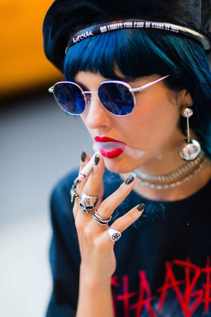 Maximalist jewelry and head accessories with blue hair