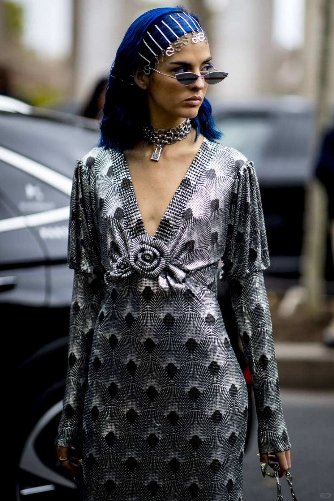 Rhinestone and metal accessories in a maximalist outfit