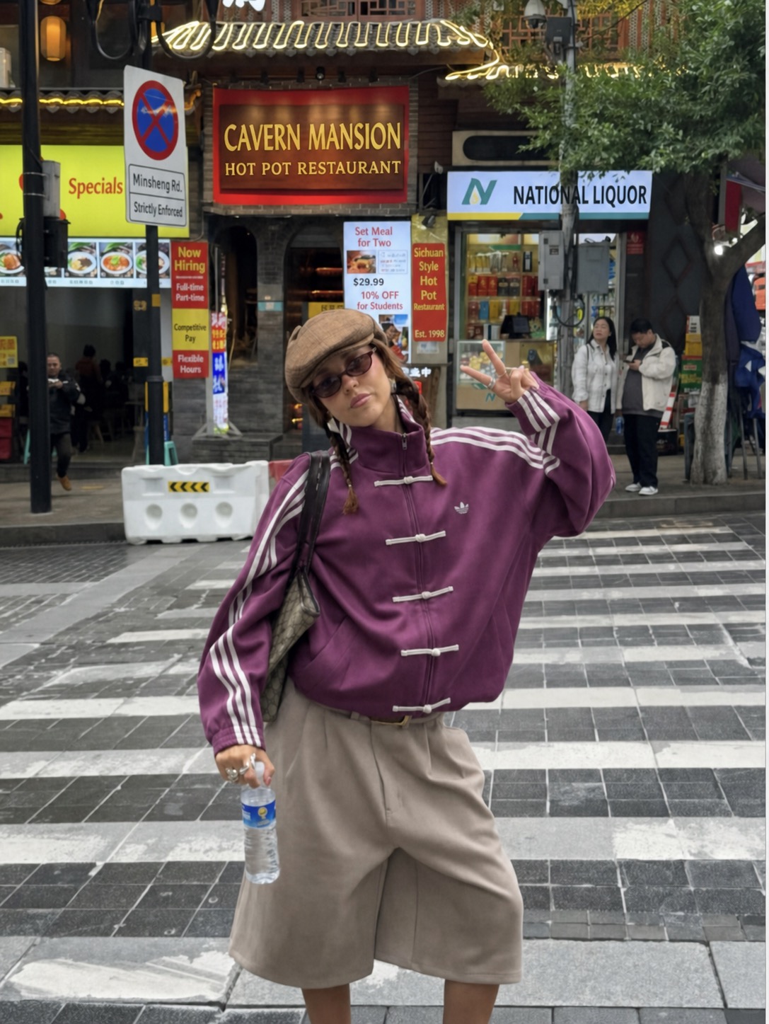 street style outfit with cap, blazer, and easy sportswear balance