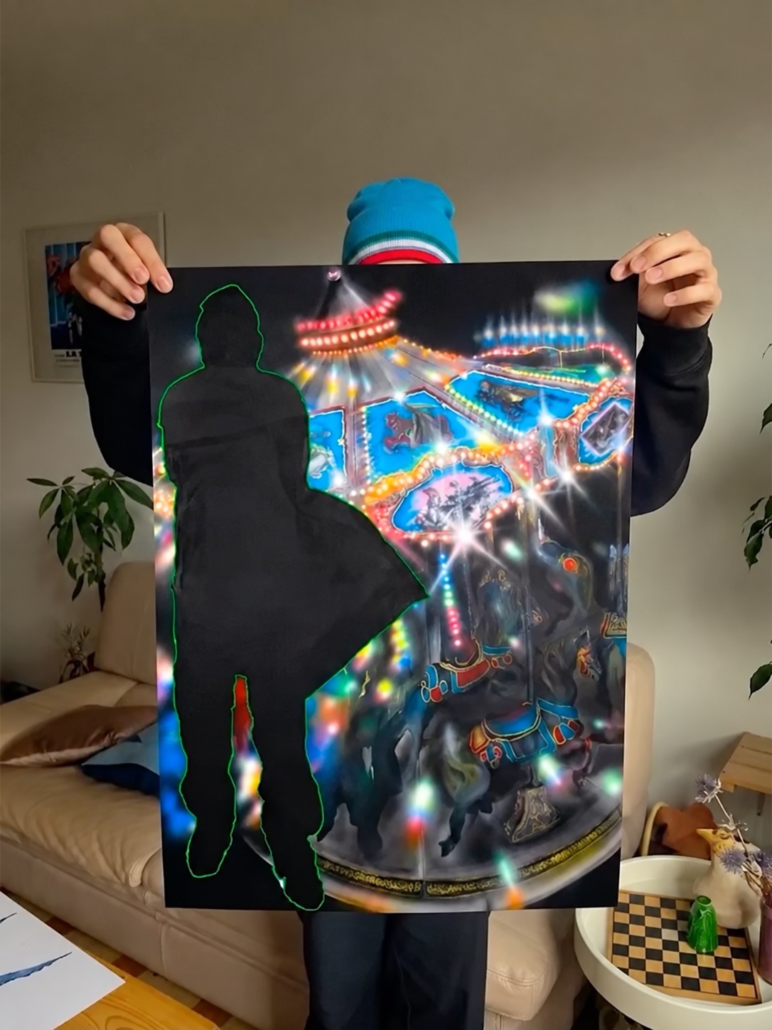 Person holding a neon surreal airbrush artwork