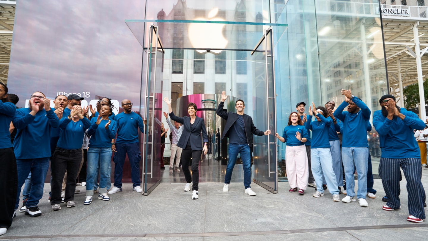 Apple team members and customers celebrating a new product launch at Apple Fifth Avenue