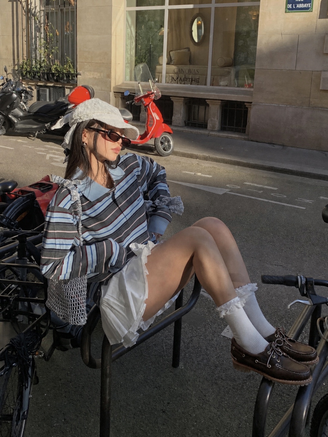 Korean street fashion look with wide trousers and small accessory details