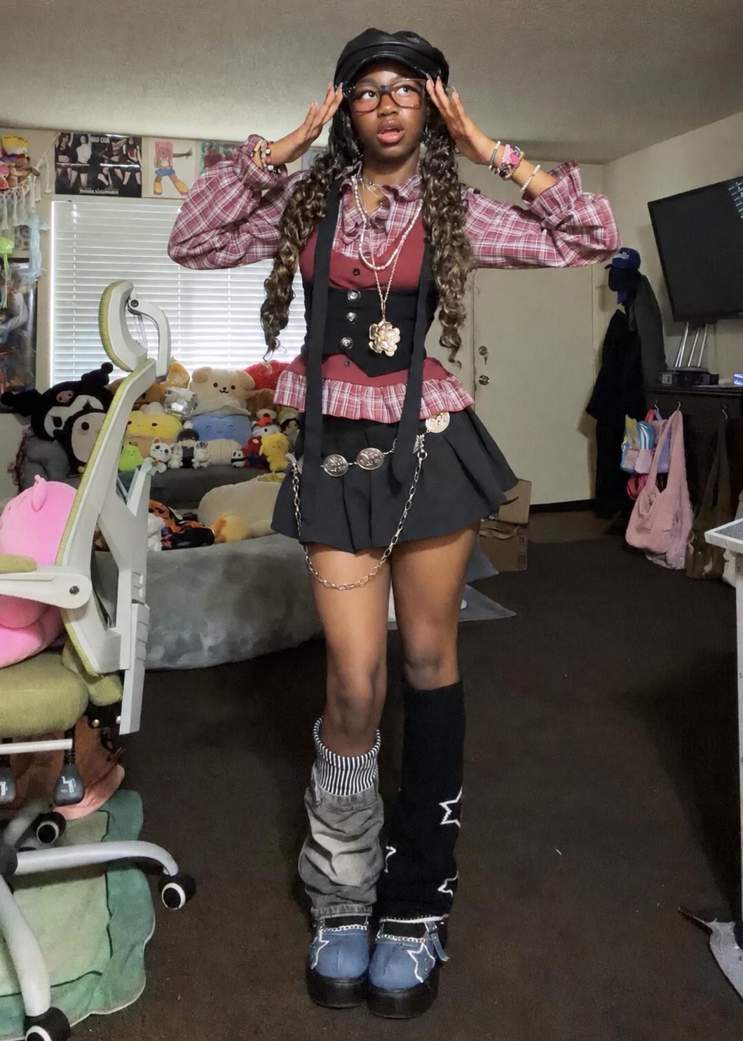 Plaid shirt, suspender skirt, chains, leg warmers, and platform Mary Janes in a steampunk-school mix